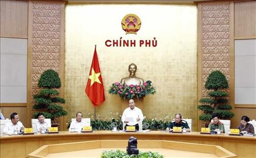阮春福主持会议。图自越通社