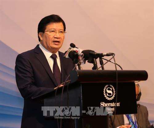 郑廷勇在会上发表讲话。（图片来源：越通社）