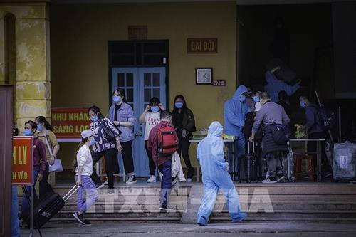 随时接待回国公民并实行安全隔离。图自越通社