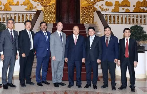 阮春福与各位代表合影。越通社记者 统一 摄 阮春福与各位代表合影。越通社记者 统一 摄