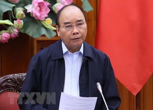 越南政府总理阮春福在新冠肺炎疫情防控工作政府常务委员会工作会议上发表讲话。图自越通社