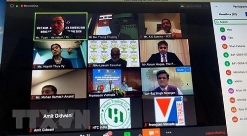 题为“越南与印度促进农产品和加工食品的贸易往来”的视频研讨会。图自越通社 题为“越南与印度促进农产品和加工食品的贸易往来”的视频研讨会。图自越通社