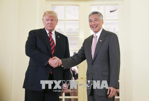 美朝历史性峰会：特朗普会见新加坡总理 ảnh 1
