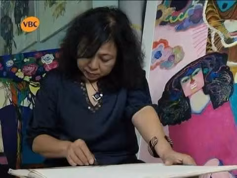 资料图：胡志明市女画家代表团成员高氏得画家。图自互联网