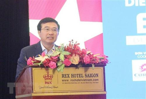 越南工贸部副部长黄国旺发表讲话。图自越通社
