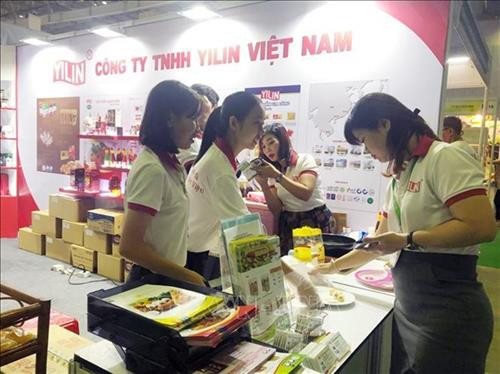 越南国际食品饮料展及越南加工技术及包装设备展览会开幕。图自越通社