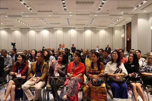 与会代表。图自越通社