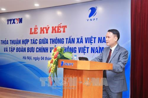 越通社社长阮德利发表讲话。（图片来源：越通社）