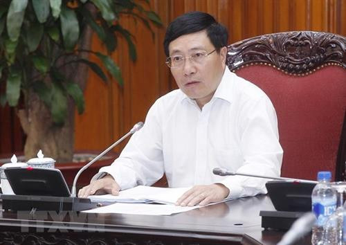 越南政府副总理兼外交部长范平明。 （图片来源：越通社）