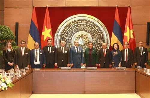 与会代表合影。图自越通社 与会代表合影。图自越通社