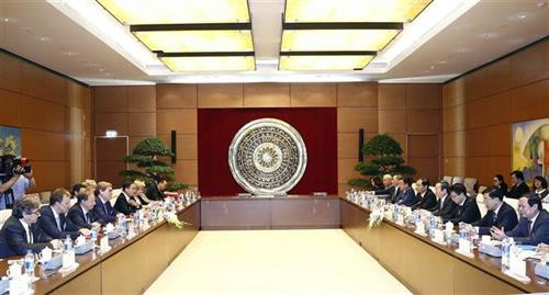 会见场景。图自越通社
