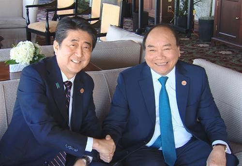 越南政府总理阮春福与日本首相安倍晋三。越通社记者 统一 摄