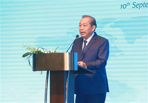 张和平在会议上发言。图自越通社