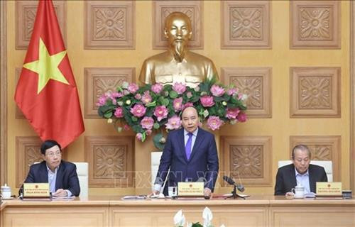 政府总理阮春福在政府常务会议上发表关于控制新型冠状病毒肺炎蔓延的指导意见。图自越通社