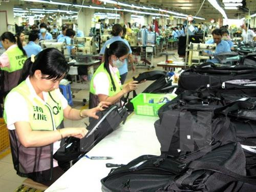 资料图:越南纺织服装行业计划扩大出口市场。(图片来源:越通社) 资料图:越南纺织服装行业计划扩大出口市场。(图片来源:越通社)