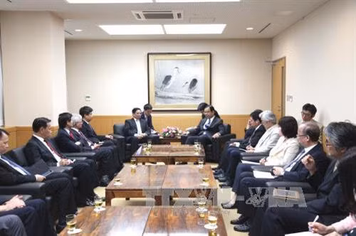 双方会见场景。（图片来源：越通社）