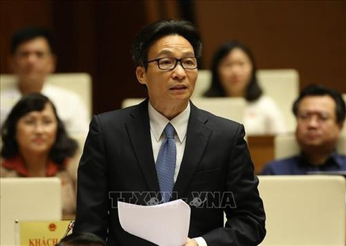 越南政府副总理武德儋回答询问。图自越通社 越南政府副总理武德儋回答询问。图自越通社