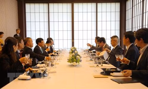 双方会谈场。图自越通社