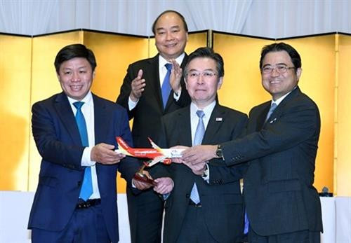 资料图:越南政府总理阮春福出席越南飞往日本三个直达航线开通仪式(图片来源:越捷航空公司提供) 资料图:越南政府总理阮春福出席越南飞往日本三个直达航线开通仪式(图片来源:越捷航空公司提供)