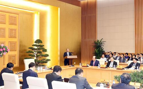 会见回国出席2018年越南改革创新网络对接活动的科技创新领域越侨人才。 越通社记者 统一 摄