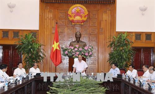 越南政府总理阮春福7月9日下午主持召开政府常务委员会例行会议。越通社记者 统一 摄