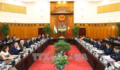 双方会谈场景。（图片来源：越通社）
