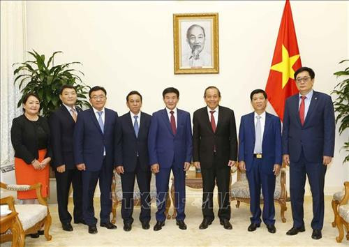 双方代表合影。图自越通社