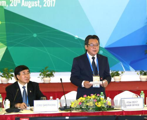 越南农业与农村发展部国际合作司司长陈金龙在APEC农业技术合作工作组会议上发言。（图片来源：越通社）