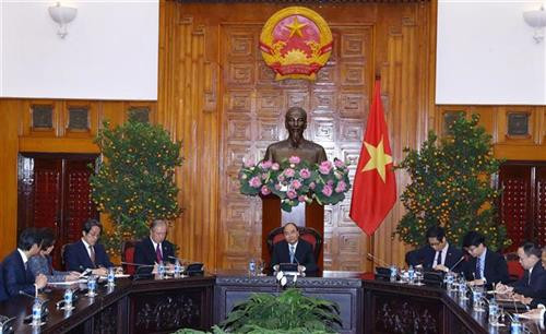 越南政府总理阮春福会见日本与湄公河经济合作委员会主席。图自越通社
