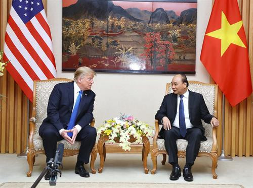 越南政府总理阮春福会见美国总统特朗普 。图自越通社