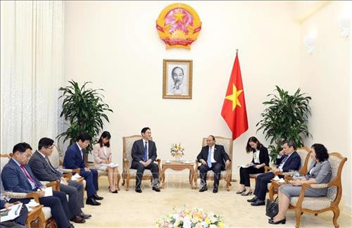 越南政府总理阮春福会见韩国三星集团副总裁李在镕。图自越通社