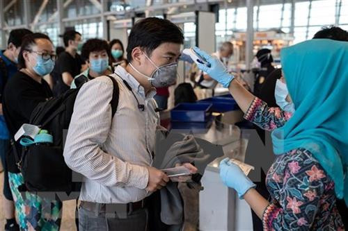 附图：马来西亚的新冠肺炎疫情形势继续复杂严峻。图自越通社