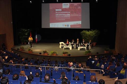 会议场景。图自越通社