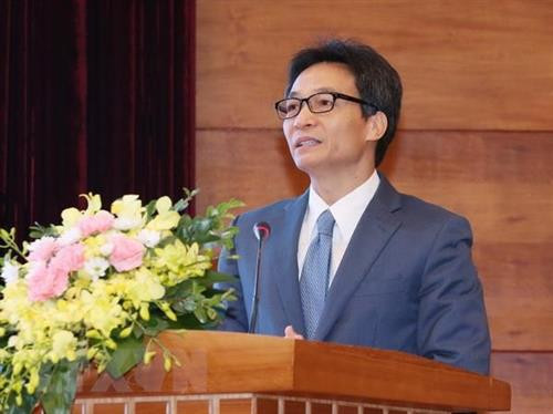 越南政府副总理武德担在会上发表讲话。图自越通社