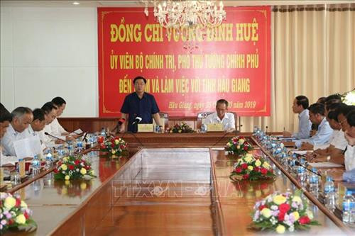 王廷惠发表讲话。图自越通社 王廷惠发表讲话。图自越通社