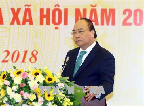 阮春福在会议上发表讲话。越通社记者 统一 摄