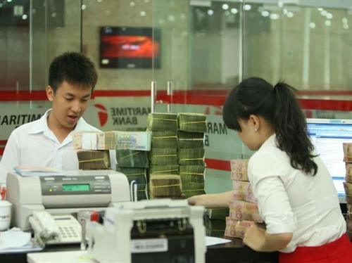 3月20日越盾兑美元中心汇率下降2越盾。图自越通社