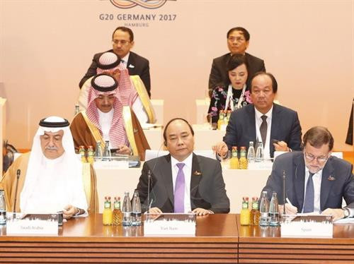 阮春福出席二十国集团议题为“与非洲伙伴关系、移民和健康”的第三次工作会议。（图片来源：越通社）