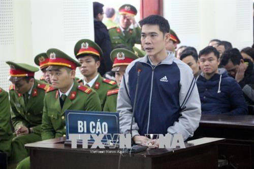 被告人阮南峰。越通社记者 碧惠 摄 被告人阮南峰。越通社记者 碧惠 摄