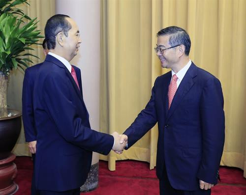 越南国家主席陈大光会见中国最高人民法院院长周强。（图片来源：越通社）