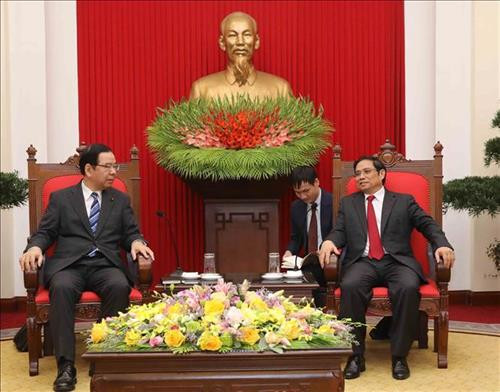 越共中央组织部部长范明正会见日本共产党中央委员会主席 图自越通社