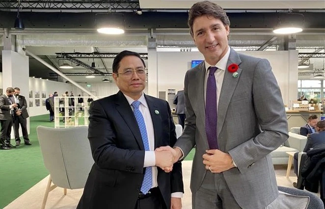 范明政总理会见加拿大总理和赞比亚总统