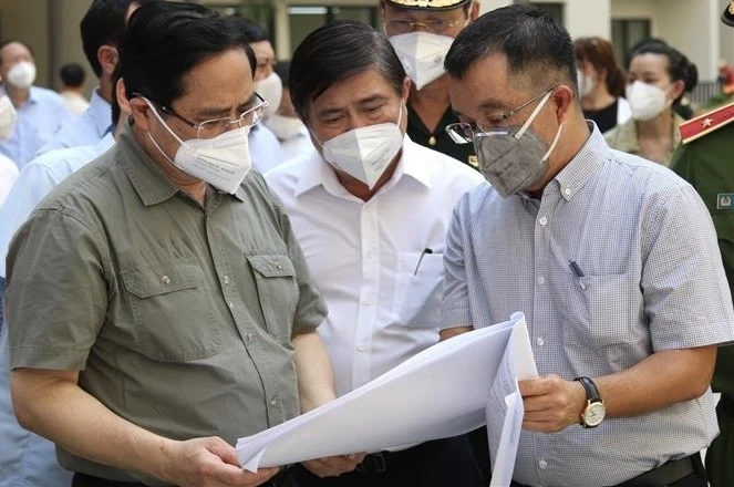范明政总理：从现在到月底将有至少200万剂新冠疫苗到达胡志明市