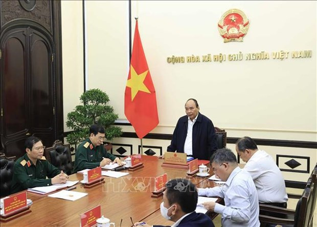 国家主席阮春福主持越共关于新形势下保卫祖国战略的决议实施情况总结会议