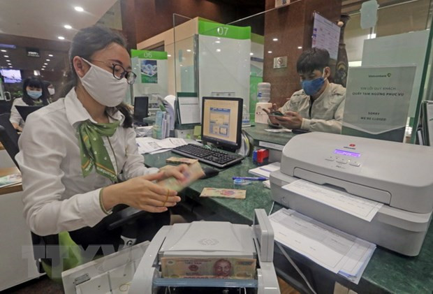19日上午越盾对美元汇率中间价下调2越盾