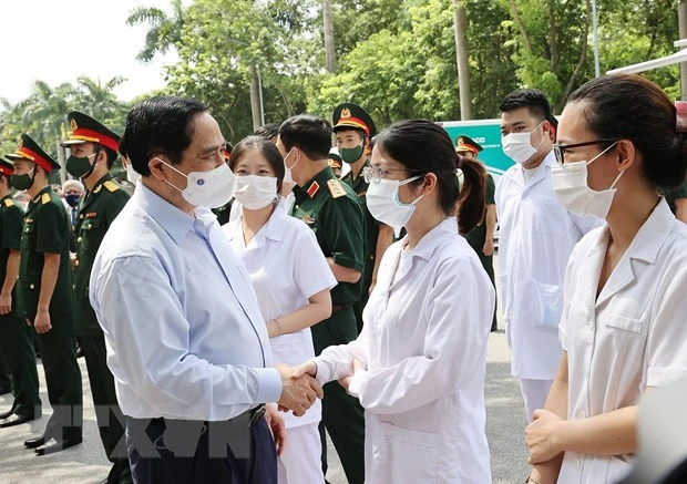 越南政府总理范明政：许多人希望优先为疫情重灾区进行新冠疫苗接种