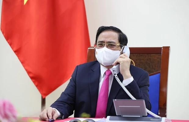  越南政府总理范明政与日本首相菅义伟通电话
