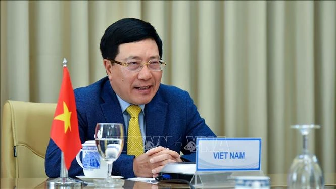 越南政府副总理兼外长范平明与委内瑞拉外长豪尔赫·阿雷亚萨举行视频会谈