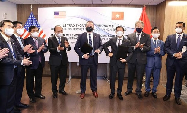 越南国家主席阮春福出席越美公司合作协议文本互换仪式