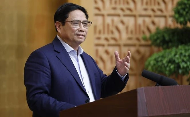 越南政府总理范明政：坚定不移保持宏观经济稳定 积极促进经济增长目标